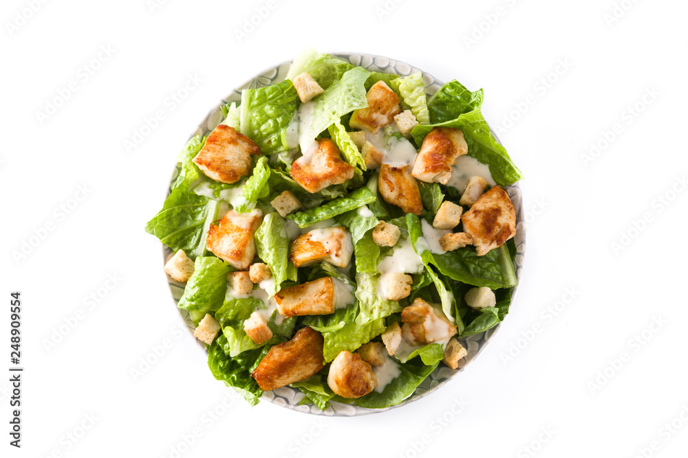 Wall mural Caesar salad with lettuce,chicken and croutons isolated on white background. Top view - Wall murals
