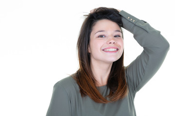 Portrait of happy smiling young beautiful woman, isolated over white background. Looking at camera free copy space for text