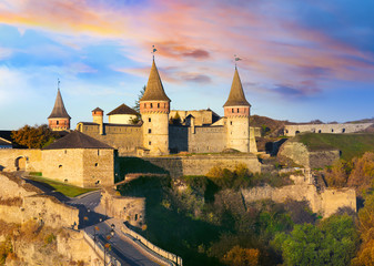 Fototapeta premium KAMIANETS-PODILSKYI, UKRAINE - OCTOBER 06, 2018: Beautiful view of Kamianets-Podilskyi Castle on sunny day
