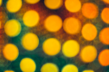 Defocused scattered dots background. Blurred bright light. Circular points. Christmas eve time. Colorful circle shapes.