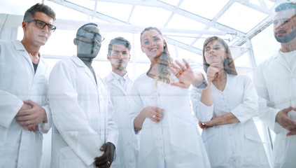 closeup of a doctor-pharmacists and colleagues working in the laboratory.