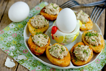 Traditional Easter snack deviled eggs stuffed with tuna yolk and mayonnaise