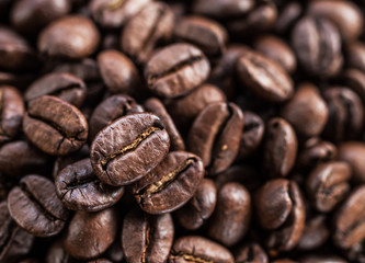 Roasted coffee beans. Food and drink background. Top view.