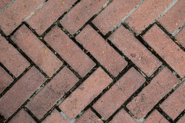 The texture of the road from red brick