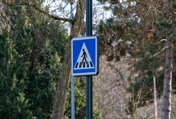 traffic sign, pedestrian crossing, mounted on a pole