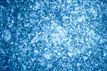 Fototapeta na wymiar Blurred texture from shining circles