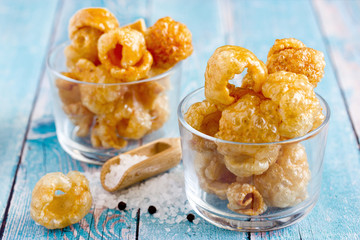 Chicharron - deep fried pork rinds, crispy pork skin pieces, traditional mexican snack