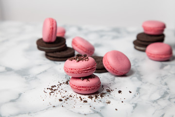 Pink macaroons with black cookies