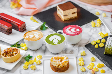 Obraz na płótnie Canvas delicious composition of latte tea with cakes