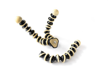 Broken gorillapod tripod isolated on white