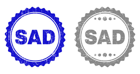 Grunge SAD stamp seals isolated on a white background. Rosette seals with grunge texture in blue and gray colors. Vector rubber stamp imitation of SAD tag inside round rosette.