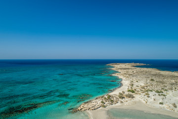 Fototapeta na wymiar Elafonissi Lagoon, Crete Island, Greece. Amazing Beach. Blue sky copy space
