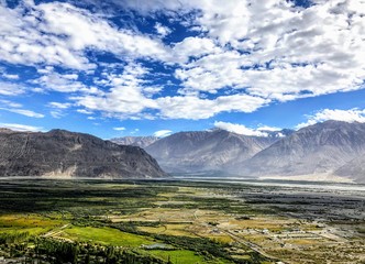 landscape with mountains and clouds