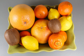 Dish of citrus on a table
