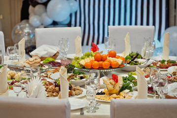 delicious dishes on the table in the restaurant. serving table.