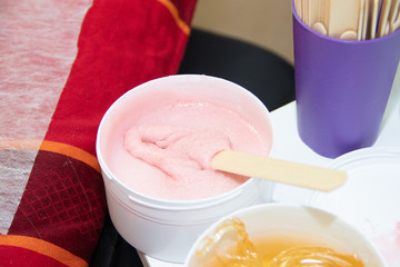 Sugar paste for depilation. Shugaring in the spa salon. Beauty and health of women. Women things.