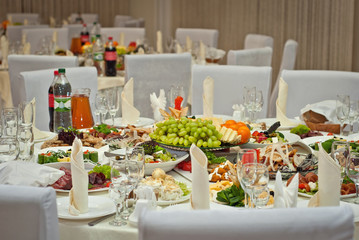 delicious dishes on the table in the restaurant. serving table.