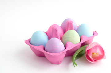 Easter color painted eggs on a white background.