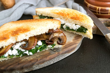 sandwich with spinach, cottage cheese and mushrooms.