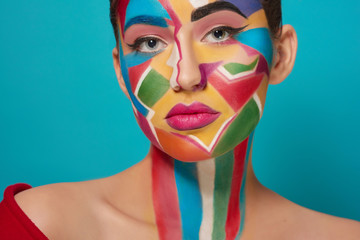 Face of beautiful model with creative make up.