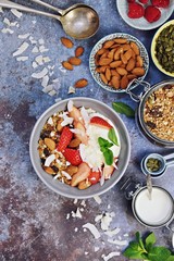 Healthy granola breakfast with nuts and berries. Top view and copy space granola bowl