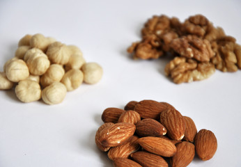 heap of mixed nuts isolated on white background