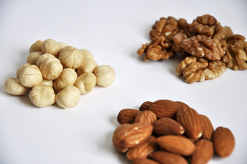 heap of mixed nuts isolated on white background