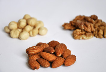 heap of mixed nuts isolated on white background