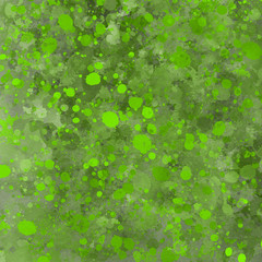 Green paint splatter effect texture on gray paper background. Artistic backdrop. Different paint drops. 