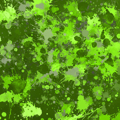 Green paint splatter effect texture on gray paper background. Artistic backdrop. Different paint drops. 
