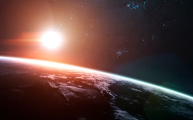 Sunrise over the Earth Planet. Science fiction art. Elements of this image furnished by NASA
