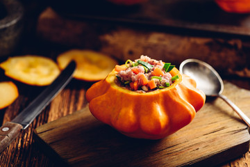 Yellow pattypan squash stuffed with minced meat, carrot and leek