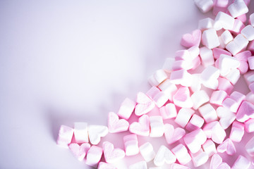 Pink and white marshmallow candies in form of hearts