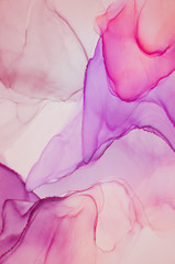 Alcohol ink wash texture on white paper background. Liquid paint flow. Transparent ethereal effect. Closeup of the painting. Highly-textured colorful abstract painting background.