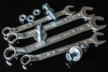 Screws, washers, nuts, keys for loosening and tightening
