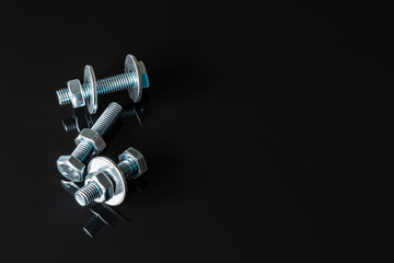 Screws, washers, nuts, keys for loosening and tightening