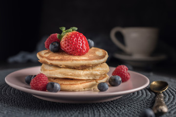 Delicious american pancakes with berries. Horizontal. Closeup