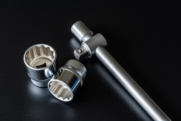 Screws, washers, nuts, keys for loosening and tightening