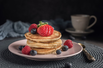 Delicious american pancakes with berries. Horizontal. Closeup