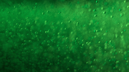 Green Particles with Depth of Filed. Realistic 3D Illustration.