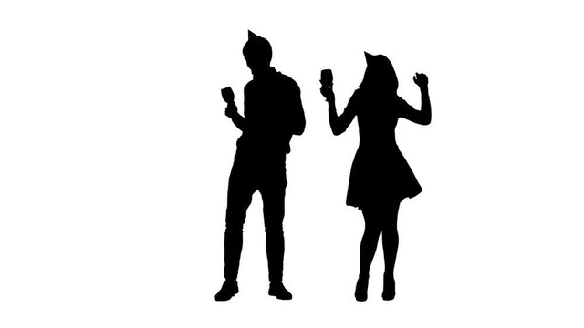 Couple dancing and drinking from glasses a party to the birthday. White background. Silhouette