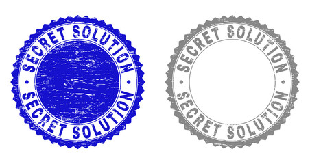 Grunge SECRET SOLUTION stamp seals isolated on a white background. Rosette seals with distress texture in blue and grey colors. Vector rubber stamp imprint of SECRET SOLUTION tag inside round rosette.