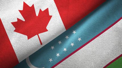 Canada and Uzbekistan two flags textile cloth, fabric texture