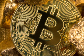 cryptocurrency golden coins - Bitcoin, Ethereum, Litecoin on the background of gold nuggets. Virtual money concept.	