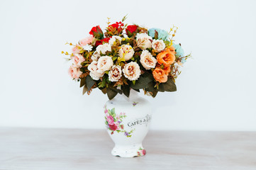 bouquet in a vase light background