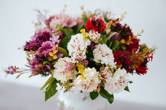 bouquet in a vase light background