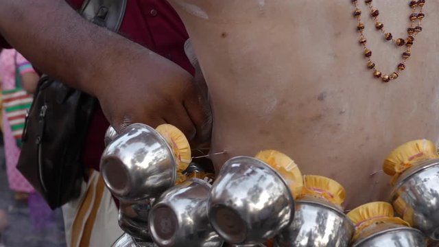 Thaipusam Festival, piercing.