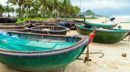 Naklejka na ściany i meble Motorized baskets boats in Da Nang landscape