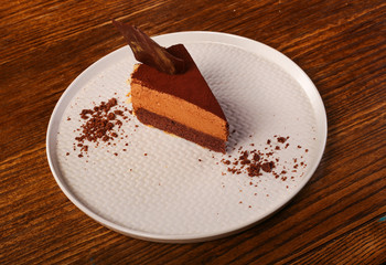 brownie cake on white plate 