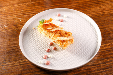 cake plate on black wood background 